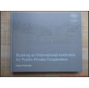 精装   12开     这是什么书      厚册《Building an International Institution for Public-   》 画册   见图