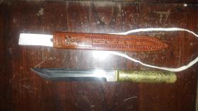 铜把钢刀，长20厘米。宽1.9厘米。重130克。