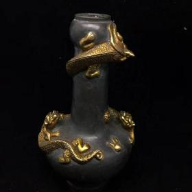 铜鎏金花瓶
保存完整
宝贝尺寸：直径约：70mm
高约：14cm
宝贝重量：393.4g