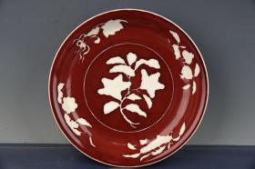 明代宣德年制祭红釉雕刻留白折枝花果纹盘子