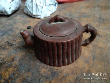 解放初小名家“周建云制”紫砂壶，竹节状，胎质匀润，包浆浑厚，全品无损。