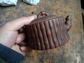 解放初小名家“周建云制”紫砂壶，竹节状，胎质匀润，包浆浑厚，全品无损。