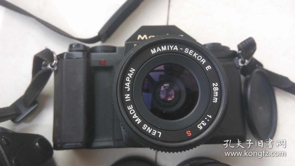 日本玛米亚Mamiya～ZM胶片单反相机。机身号v163981。单独多带一个镜头。功能未知，无法试机。外观如图实物拍照