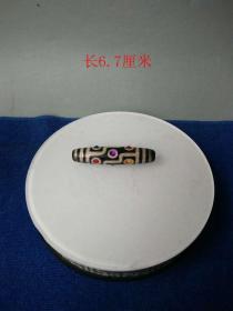 少见清代藏传嵌银宝石九眼天珠