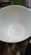明代瓷杯一只   豆青色釉   胎特别薄  五公分左右  包老包真