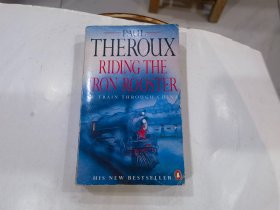 PAUL THEROUX RIDING THE IRON ROOSTER