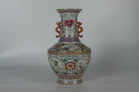 清乾隆-珐琅彩缠枝开窗花卉方肩双耳瓶 高度32cm,口径11.5cm.肚径20cm.底径11.5cm