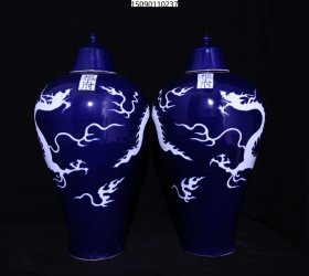 元枢府款祭蓝釉留白雕刻龙纹梅瓶一对，高49×25厘米