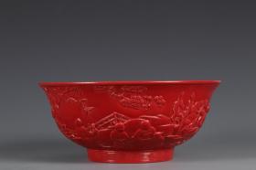 清代，“大清乾隆年制”红釉浮雕婴戏图碗