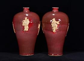 元霁红露胎雕刻八仙纹梅瓶
