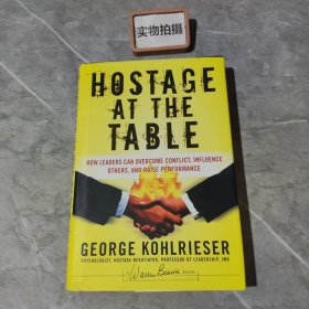 HOSTAGE AT THE TABLE