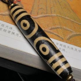 藏区回流老料高油包浆亚黄七眼天珠搭配一线天珠、两眼天珠三通、沉香编制项链
尺寸：七眼78*15毫米 沉香10*8毫米