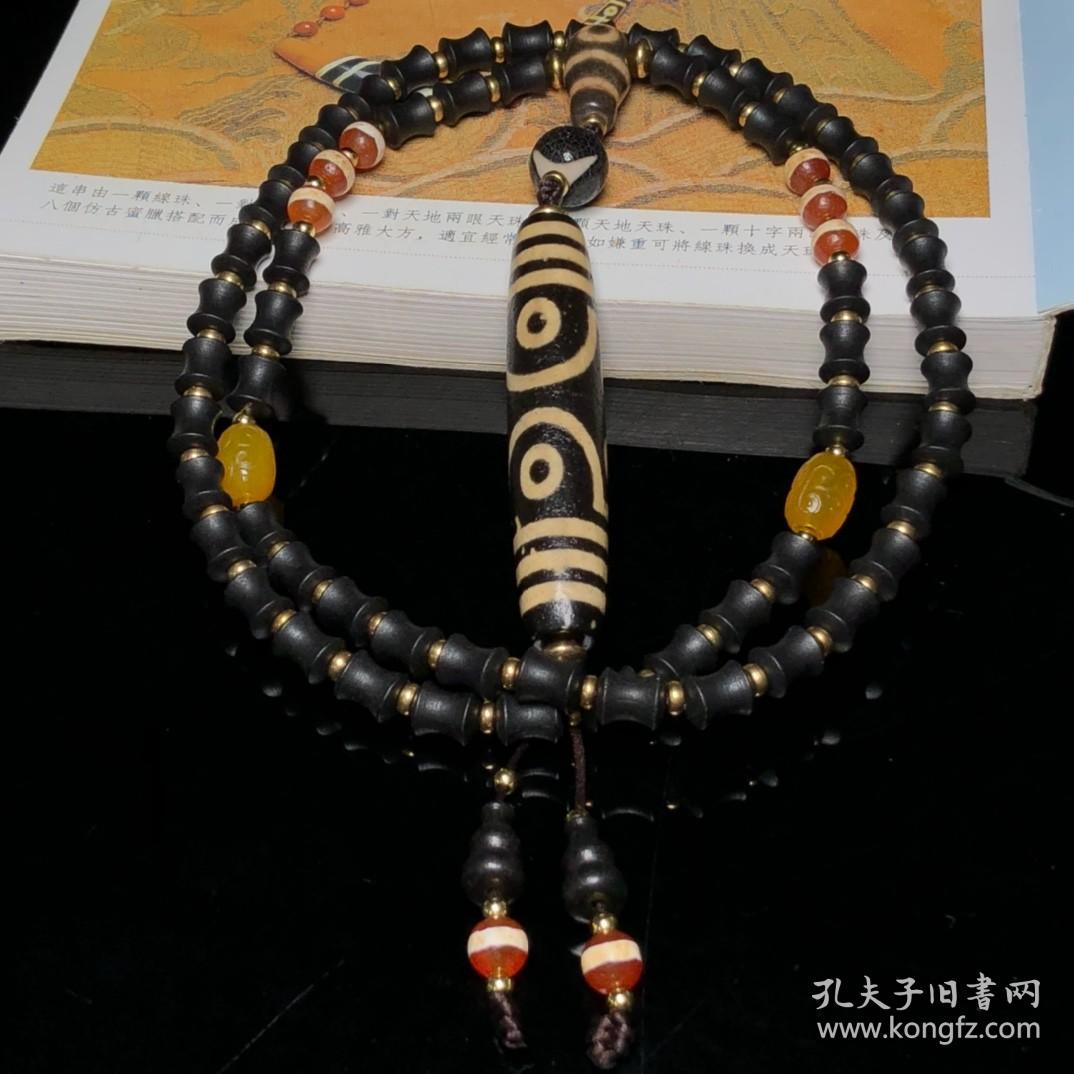 藏区回流老料高油包浆亚黄七眼天珠搭配一线天珠、两眼天珠三通、沉香编制项链
尺寸：七眼78*15毫米 沉香10*8毫米