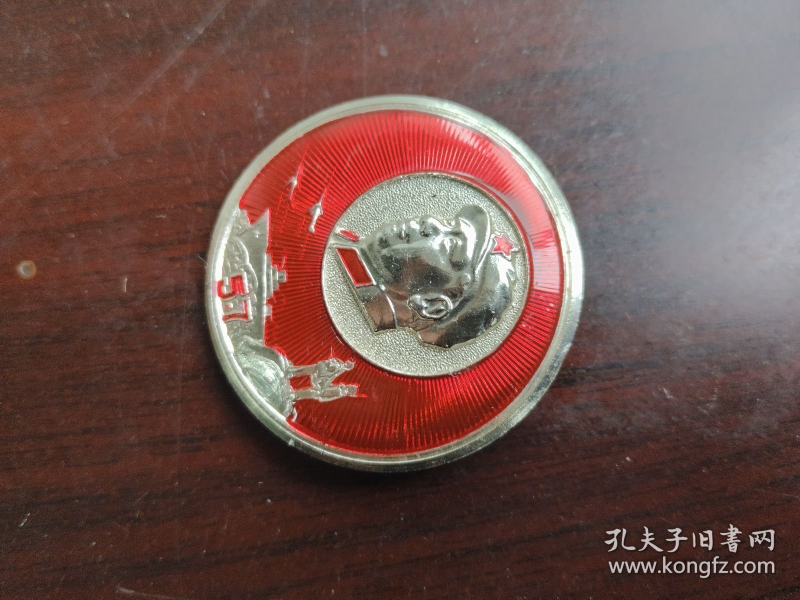 3.8cm毛主席像章，正面，5.7指示，背面：忠、毛主席万岁，中国人民解放军北京203部队，包老保真，编号：219