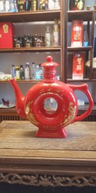 泸州国贸酒业“福龙宴.陶藏15年”，42°500ml浓香型，红瓷烫金工艺酒瓶
