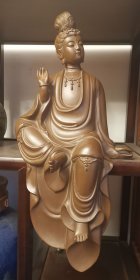紫砂观音佛像，面容祥和，做工精巧，等候有缘人