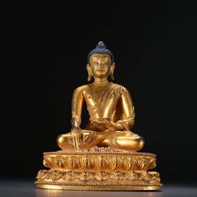 清代 铜鎏金释迦牟尼佛坐像。