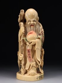 回流.雕寿星公立像