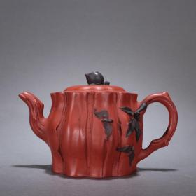 清末-蒋燕亭款紫砂树桩纹茶壶。