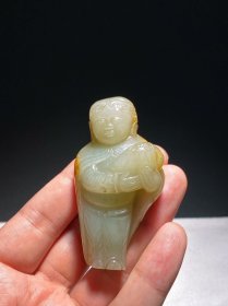 明 和田玉籽料 白玉受沁 胡人献宝 把件摆件 长3.7 宽2.5 高7.1厘米 重78.6克