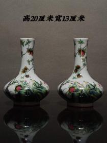 大清雍正年制粉彩花鸟赏瓶一对，胎质细腻洁白，画工精美，品相如图