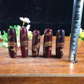 45_精美龙纹玛瑙天珠，包浆均匀自然，皮壳老辣，保存完整无残缺，品相如图。喜欢联系。