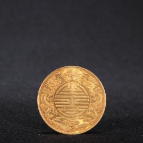 清代-纯金光绪元宝龙纹金币。