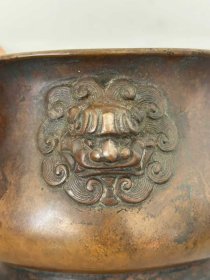 18_大明宣德年制款，圆足兽头耳铜香炉一只。