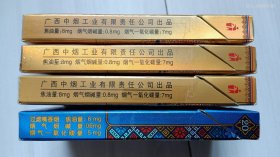 真龙100mm烟标，4枚不同：广西中烟工业有限责任公司出品，焦8，民族歌仙刘三姐