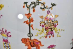 清乾隆矾红釉皮球花通开窗粉彩祥瑞博古纹盖罐  
高33厘米 直径23厘米