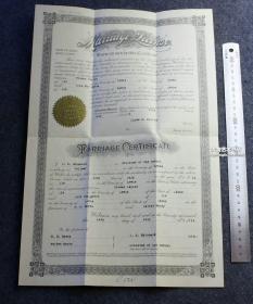 1911年7月17日爱达荷州刘易斯县托马斯先生和依瑞斯小姐结婚证书一张。比较特殊的是背面有1955年7月28日前县审核记录官员证明此证书真实有效的文字。大幅，42X27厘米