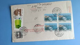 1990年贴T128（4-1）8分建设成就邮票四方联的挂号自然实寄封，南昌寄湘潭