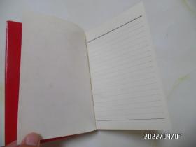 红塑皮笔记本（32开，内无写字，有黄书斑，详见图S）