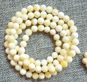 天然贝壳手串脖挂项链108棵佛珠俏色黄