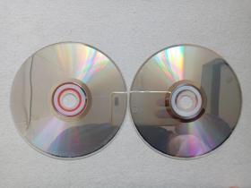 《爱的奉献（抗震救灾大型晚会）》星空传媒·原人原唱·高清画质·2VCD音乐歌曲·综艺影视光碟、光盘、唱片、歌碟、影碟2碟片1盒装2008年（云南民族文化音像出版社出版发行）