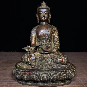 铜泥金释迦摩尼如来佛像，高23.5厘米，宽17.5厘米，重1810克