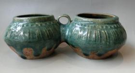 百年历史传承、造型雅致、民国铜官窑孔雀绿印花双联罐