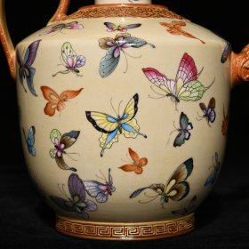 清乾隆黄地珐琅彩鎏金百蝶纹执壶 高21cm直径19cm 价格6500