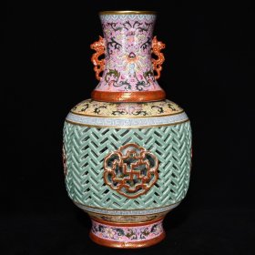 清乾隆青釉镂空珐琅彩花卉纹转心瓶，39×23厘米 价:10400