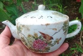 窑内造底款粉彩花鸟纹陶瓷茶壶