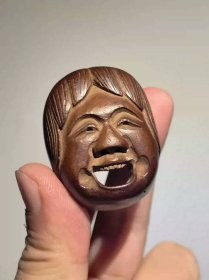民国日本回流老木雕面具吞口烟宠