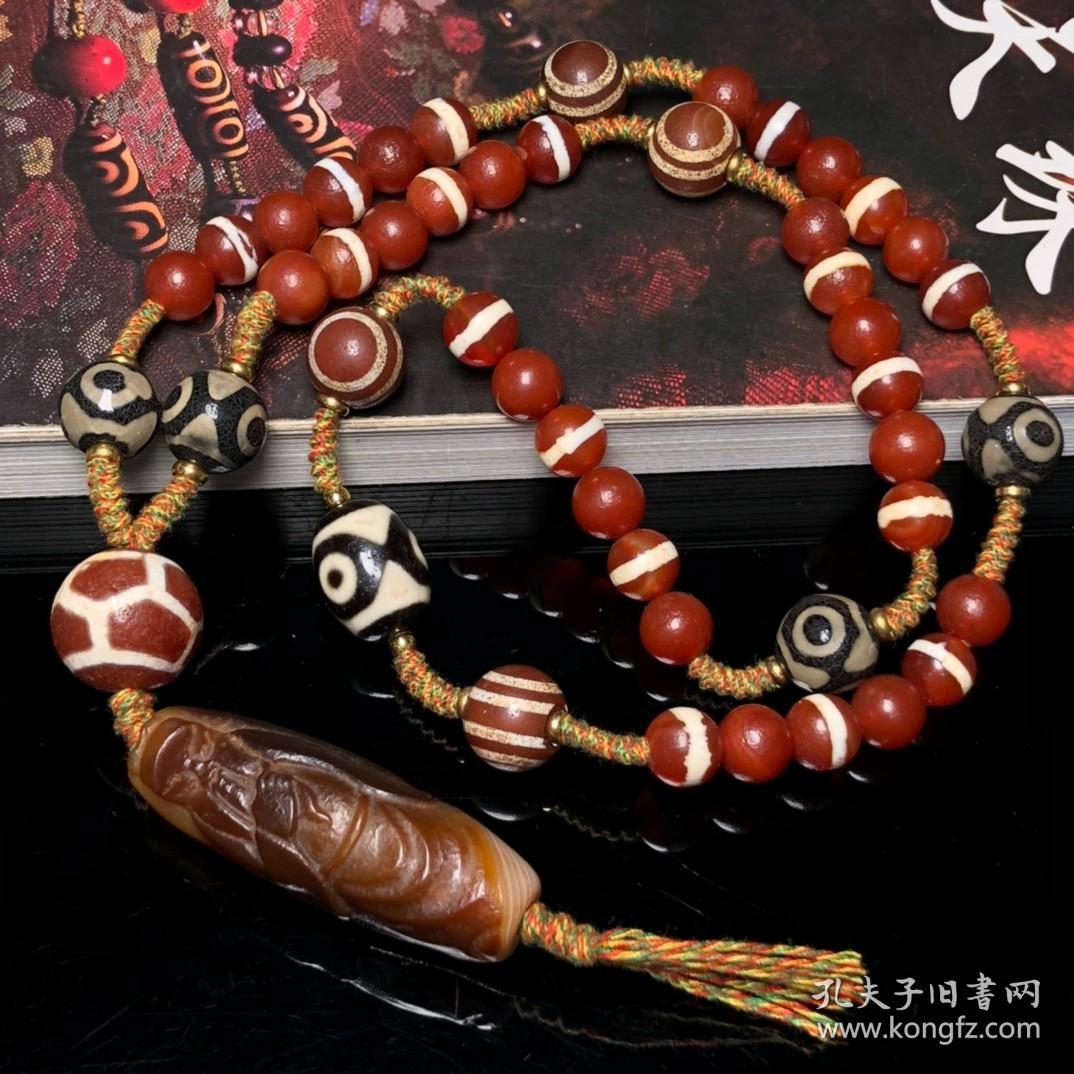 点击查看原图 藏区回流一线药师搭配关公天珠编制项链
尺寸:一线10毫米 天珠54*19毫米