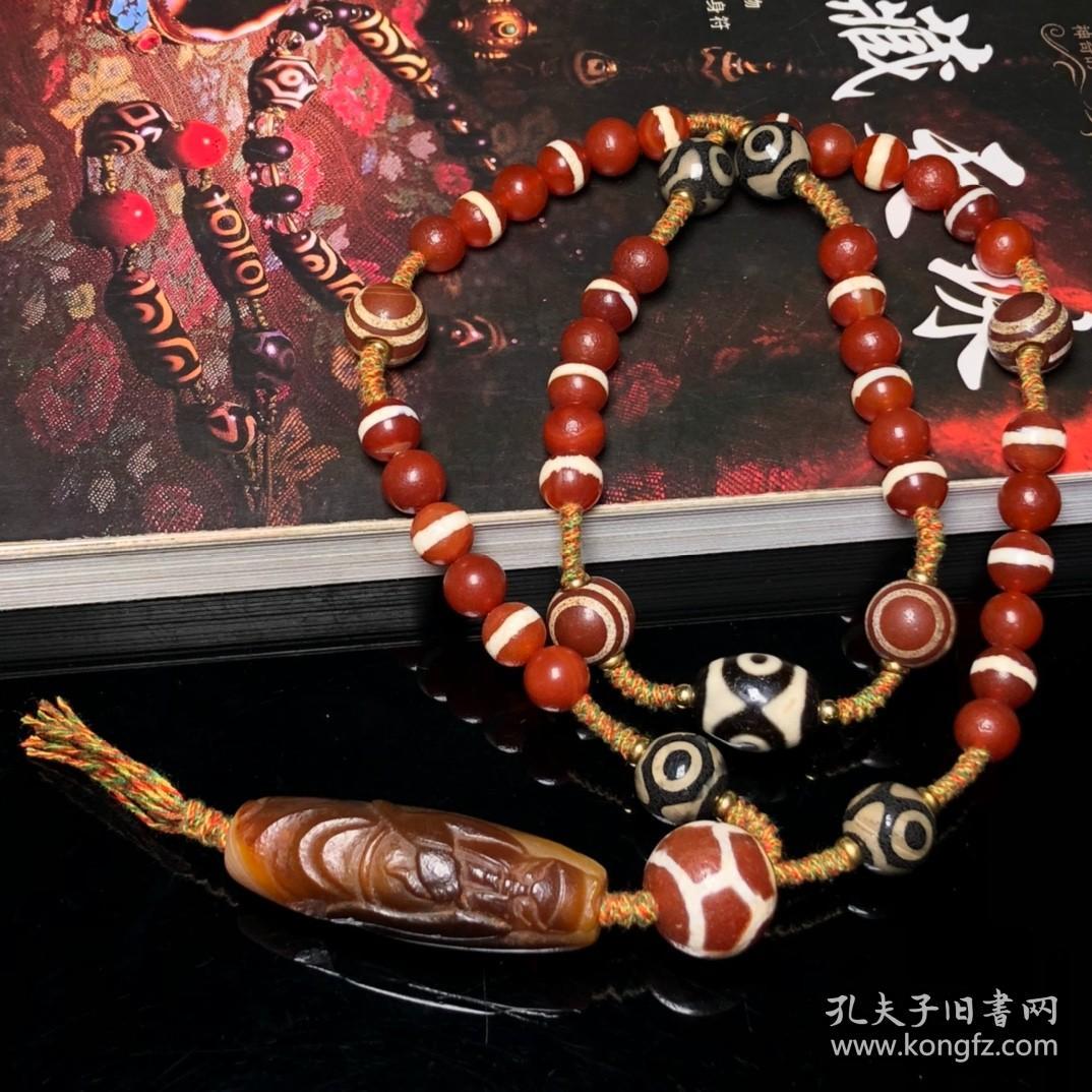 点击查看原图 藏区回流一线药师搭配关公天珠编制项链
尺寸:一线10毫米 天珠54*19毫米