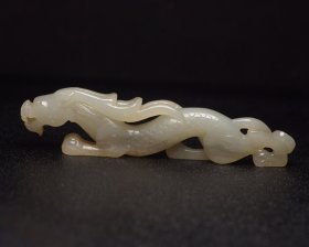 和田玉龙    
规格:12×2.8×1.3厘米   重 63克。