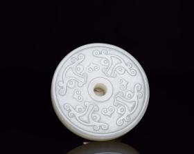 和田玉兽面乳钉璧，规格:5.7×5.7×1厘米，重量:65克