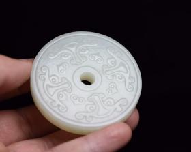 和田玉兽面乳钉璧，规格:5.7×5.7×1厘米，重量:65克