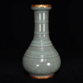 官窑包铜弦纹瓶，22.5×13，价格:540