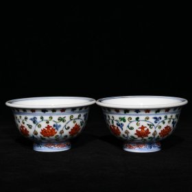 明永乐青花五彩狮子滚绣球纹压手杯，高5.2cm直径9.5cm，价格900