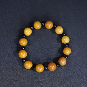 珍藏寿山石籽料圆珠手链一条,圆珠直径1.2厘米,重31克,价格2000元,代理加价,运费自理!