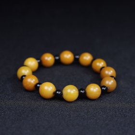 珍藏寿山石籽料圆珠手链一条,圆珠直径1.2厘米,重31克,价格2000元,代理加价,运费自理!